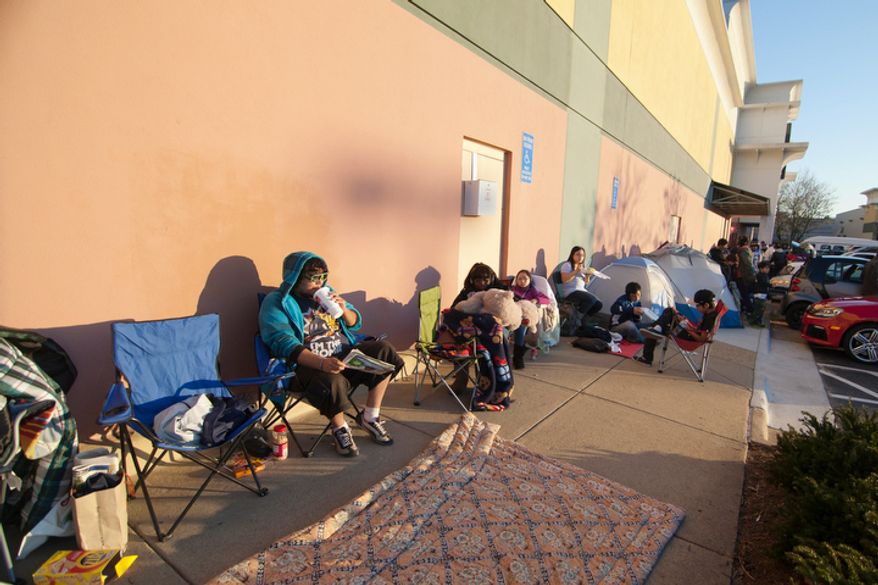 Shoppers wait in line to be let into Best Buy on Thanksgiving Day, Springfield, Va., Thursday, November 22, 2012. (Craig Bisacre/The Washington Times)