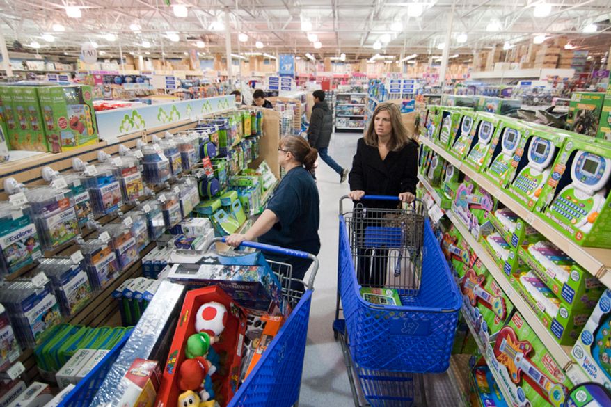 Shoppers look for bargains at Toys'R'Us on Thanksgiving Day, Fairfax, Va., Thursday, November 22, 2012. The stores, which opened nationwide at 8PM, will remain open for 24 hours for Black Friday. (Craig Bisacre/The Washington Times)