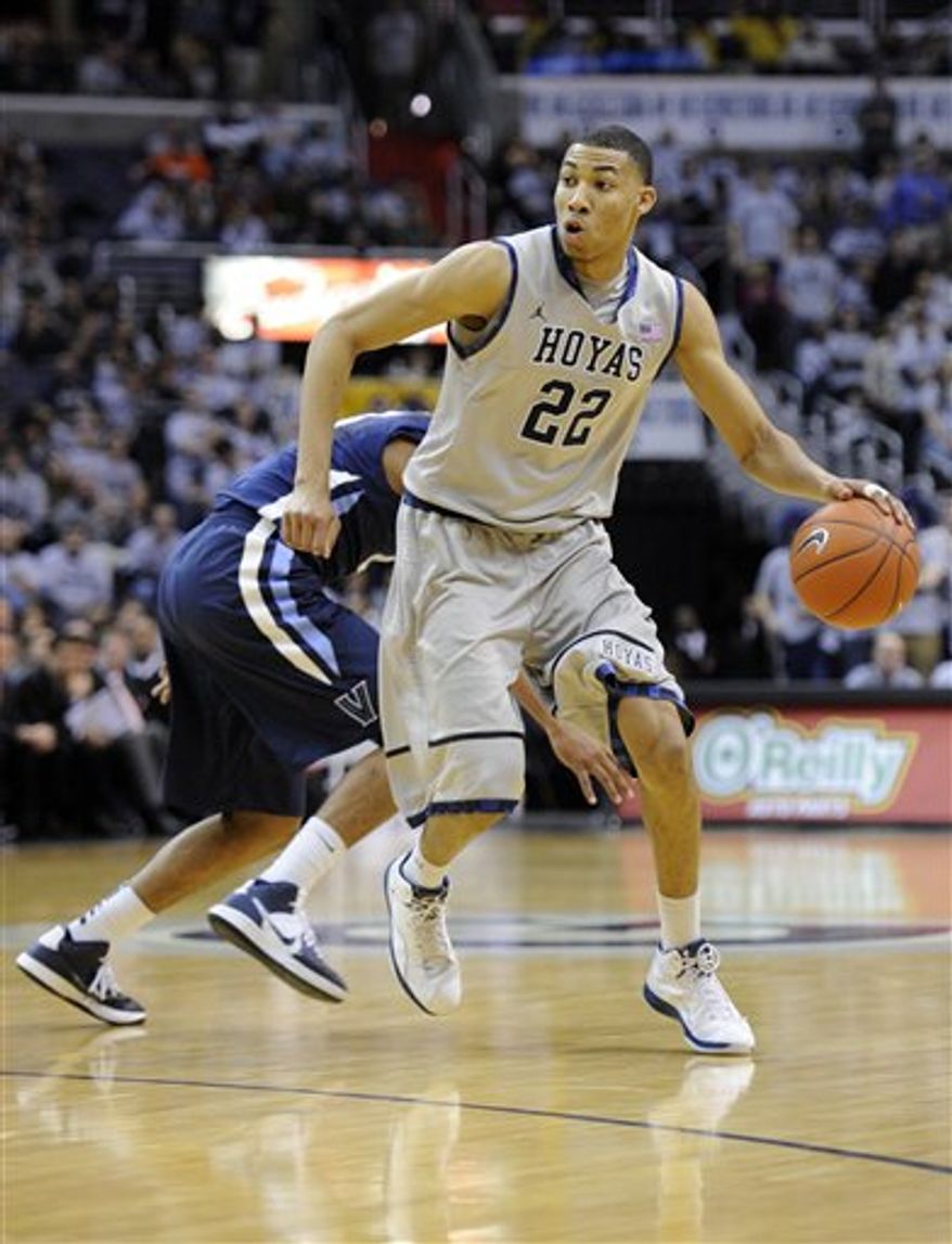FILE - In this Feb. 25, 2012 file photo Georgetown University basketball forward Otto Porter (22) dribbles the ball against Villanova during a NCAA college basketball game in Washington. Porter, Georgetown's best player is a sophomore. Two other members of the starting lineup also could be guys who were freshmen a year ago, Greg Whittington and Mikael Hopkins. There is not a single senior on coach John Thompson III's roster. And only two juniors are expected to see significant minutes. (AP Photo/Nick Wass, File)