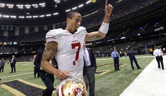 San Francisco 49ers quarterback Colin Kaepernick (7)  gestures after his second start in an NFL football game against the New Orleans Saints in New Orleans, Sunday, Nov. 25, 2012. The 49ers defeated the Saints 31-21. (AP Photo/Bill Feig)