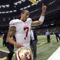 San Francisco 49ers quarterback Colin Kaepernick (7)  gestures after his second start in an NFL football game against the New Orleans Saints in New Orleans, Sunday, Nov. 25, 2012. The 49ers defeated the Saints 31-21. (AP Photo/Bill Feig)