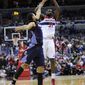 Washington Wizards forward Chris Singleton (31) shoots against Charlotte Bobcats forward Jeffery Taylor, left, during the first overtime period of an NBA basketball game on Saturday, Nov. 24, 2012, in Washington. Charlotte won 108-106. (AP Photo/Nick Wass)