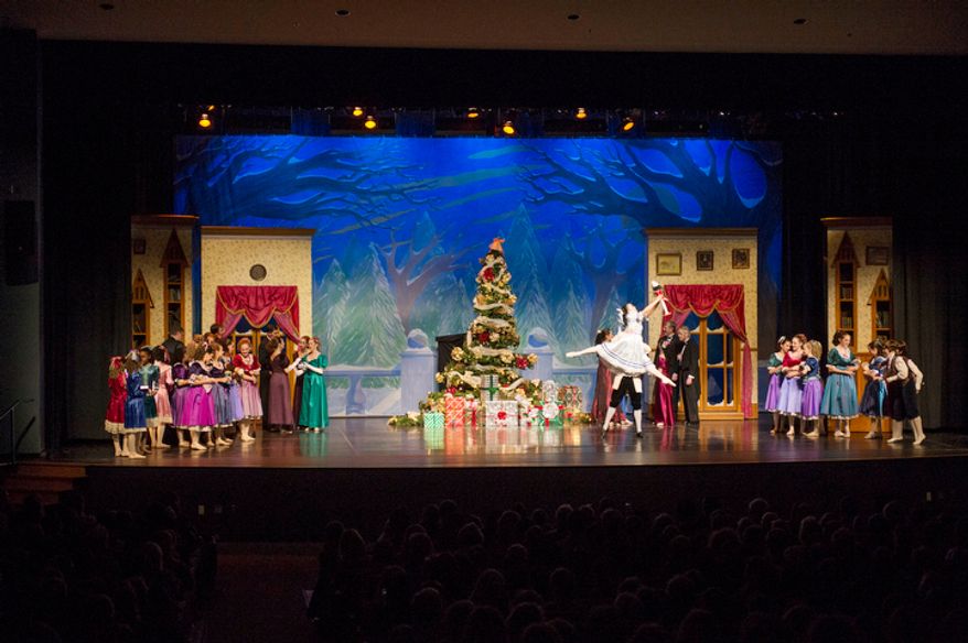 Dancers perform in Act one, Scene one of The Nutcracker at W.T. Woodson High School in Fairfax, Va., Sunday, Nov. 25, 2012. This is the final day of the show which is presented by the Fairfax Ballet 2012. (Rod Lamkey Jr./The Washington Times)