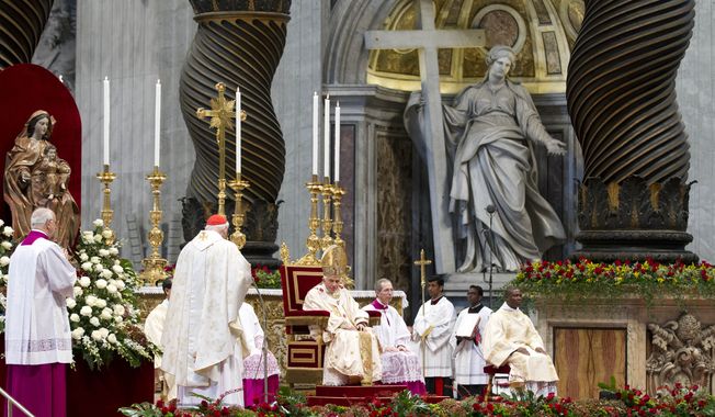 Pope Benedict XVI (seated at center) listens as newly elevated Cardinal James Michael Harvey (second from left) of the United States delivers his speech during a Mass celebrated for the six new &quot;princes&quot; of the church in St. Peter&#x27;s Basilica at the Vatican on Sunday, Nov. 25, 2012. (AP Photo/Andrew Medichini)