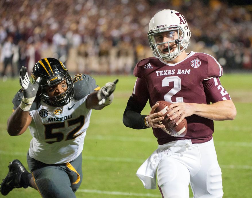 associated press
Freshman quarterback Johnny Manziel has amassed 4,600 yards of offense for 10th-ranked Texas A&M.