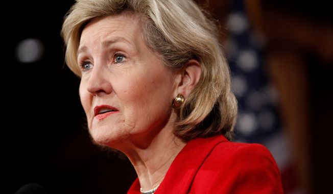 ** FILE ** Then-Sen. Kay Bailey Hutchison, Texas Republican, speaks about financial reform on Capitol Hill in Washington on Wednesday, April 21, 2010. (AP Photo/Charles Dharapak)