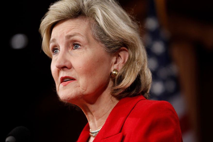 ** FILE ** Then-Sen. Kay Bailey Hutchison, Texas Republican, speaks about financial reform on Capitol Hill in Washington on Wednesday, April 21, 2010. (AP Photo/Charles Dharapak)