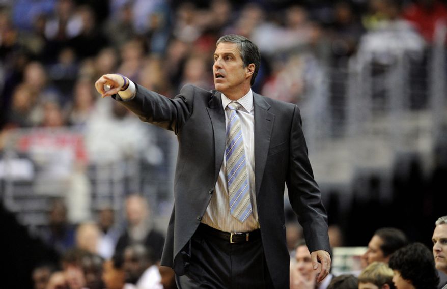 Washington Wizards head coach Randy Wittman points during the second half of an NBA basketball game against the Charlotte Bobcats, Saturday, Nov. 24, 2012, in Washington. Charlotte won 108-106 in double overtime. (AP Photo/Nick Wass)