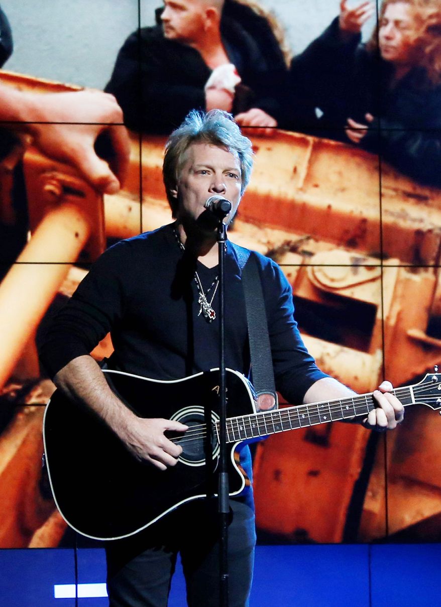 Jon Bon Jovi will perform at the Superstorm Sandy benefit concert at Madison Square Garden on Dec. 12. Dave Grohl, Eddie Vedder, Bruce Springsteen & The E Street Band, and Paul McCartney also will perform. (Associated Press)