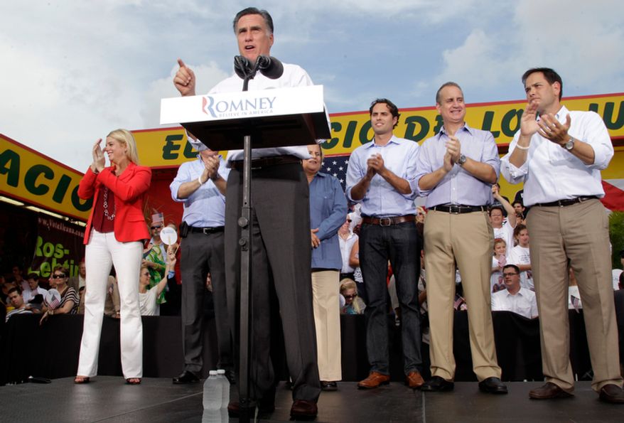 Republican presidential candidate Mitt Romney speaks during a campaign event at El Palacio de los Jugos in Miami on Monday, Aug. 13, 2012. Puerto Ricans and Cubans are the largest Latin American communities in Florida, and their votes could decide the state in the 2012 presidential election. (AP Photo/Mary Altaffer)