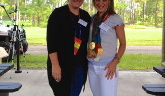 Five-time Olympian medal winner in shooting Kim Rhode with TWT&#39;s Emily Miller. 