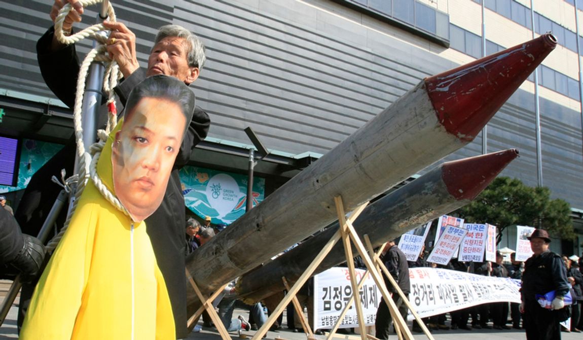 A South Korean protester hangs an effigy of North Korean leader Kim Jong-un near the North&#x27;s mock missiles in Seoul on Tuesday, March 20, 2012, during an anti-North Korea rally denouncing the North&#x27;s plan to launch a long-range rocket. North Korea vowed Sunday to go ahead with plans to launch the rocket, rejecting criticism in the West that it would scuttle recent diplomacy. (AP Photo/Lee Jin-man)