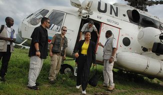 In this photo released by the United Nations Mission in Sudan (UNMIS), U.N. Security Council delegation members Susan Rice (center), U.S. ambassador to the United Nations, and Nestor Osorio (leaving helicopter) of Columbia arrive in Malau, Sudan, on Tuesday, May 24, 2011. Seventy northern Sudanese troops were killed and more than 120 are missing from an attack last week by southern Sudanese forces near the disputed region of Abyei, a Sudanese diplomat said Tuesday, while Ms. Rice called the incident a &quot;serious violation&quot; of the peace agreement. (AP Photo/UNMIS, Paul Banks) 