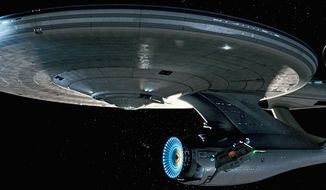 The USS Enterprise from the “Star Trek” movies and TV shows has traveled the galaxies and captured the imaginations of fans such as BTE Dan, who is on a quest to build a similar spaceship. “We are destined to be in space in a big way,” he says. (Paramount Pictures/spyglass Entertainment)