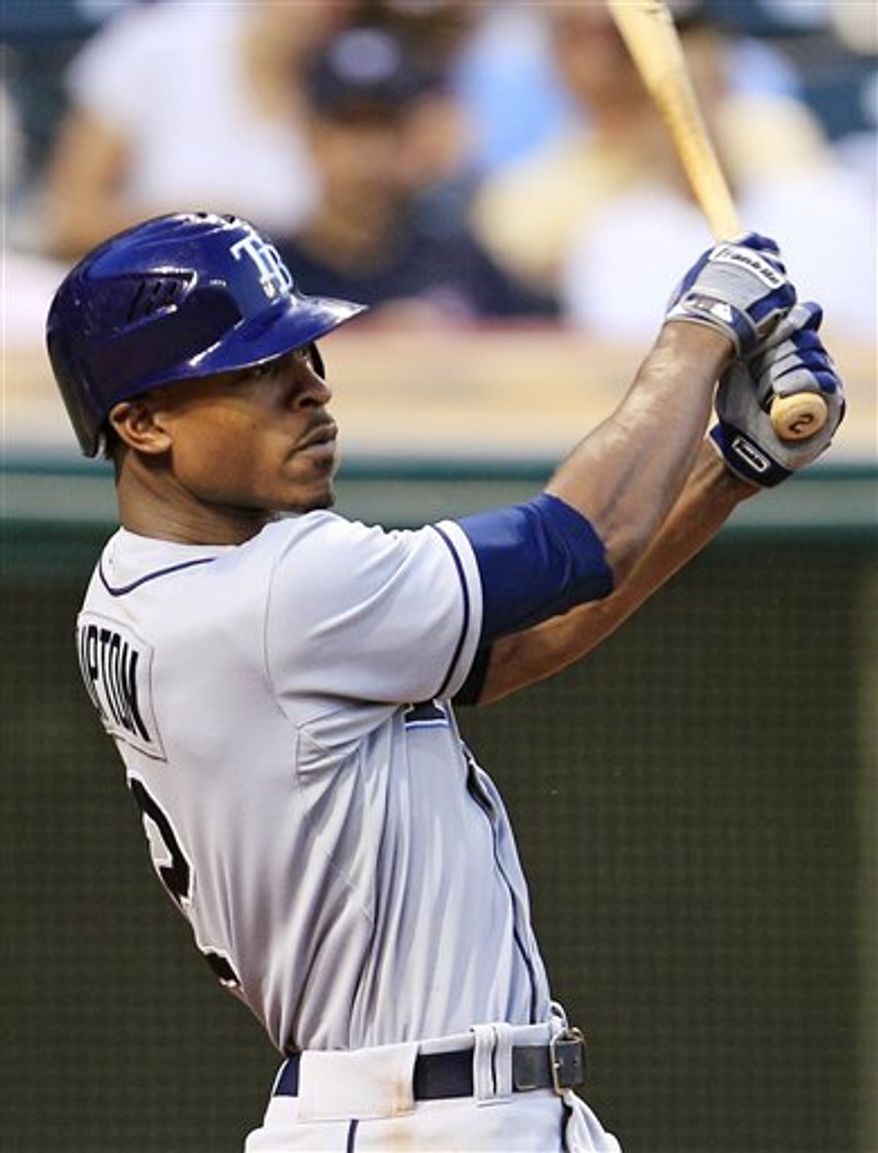 ** FILE ** In this July 6, 2012, photo, Tampa Bay Rays' B.J. Upton hits against the Cleveland Indians in Cleveland. A person familiar with the deal told The Associated Press Wednesday, Nov. 28, the Atlanta Braves have reached an agreement on a five-year deal with Upton. (AP Photo/Tony Dejak, File)