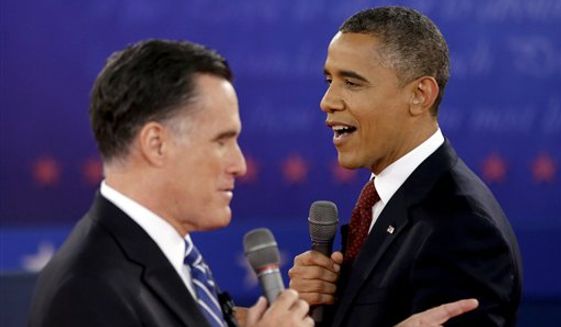**FILE** President Obama (right) and Republican presidential candidate and former Massachusetts Gov. Mitt Romney exchange views during the second presidential debate at Hofstra University in Hempstead, N.Y., on Oct. 16, 2012. (Associated Press)