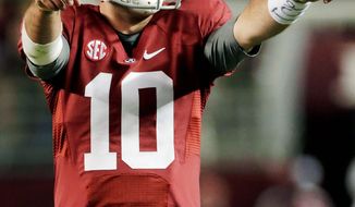 AJ McCarron is 23-2 as the starting quarterback for Alabama entering the SEC championship game Saturday. His Georgia counterpart, Aaron Murray, is the highest-rated quarterback in the country. (Associated Press)