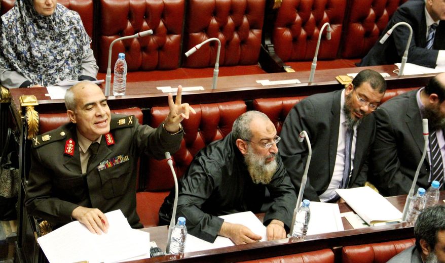 Members of the Islamist-dominated Egyptian Constitutional Assembly pushed through a final draft of a new constitution Thursday over the objections of more liberal members. The move is likely to stoke a deepening political crisis between the president and the opposition. (Associated Press)