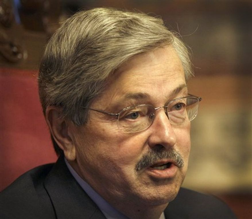 ** FILE ** Iowa Gov. Terry Branstad speaks during an interview with The Associated Press, in this May 11, 2011 photo. The Iowa straw poll has devolved into a full-blown sideshow, Branstad and other critics contend. They say it's an unfair and false test that has felled good candidates and kept others from competing in the state. (Associated Press)