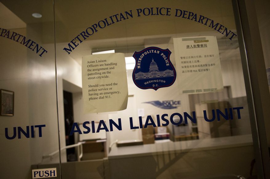 The Metropolitan Police Department's Asian Liaison Unit, pictured on Wednesday, Nov. 28, 2012, is scheduled to be relocated from its current office on H Street Northwest in the heart of Washington's Chinatown. (Rod Lamkey Jr./The Washington Times)