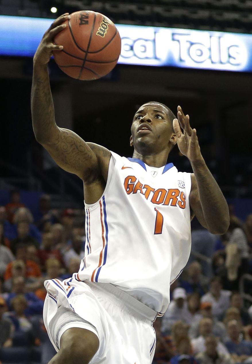 Florida guard Kenny Boynton (1) goes up for two of his 20 points during the second half of an NCAA college basketball game against Middle Tennessee, Sunday, Nov. 18, 2012, in Tampa, Fla. Florida won the game 66-45. (AP Photo/Chris O'Meara)