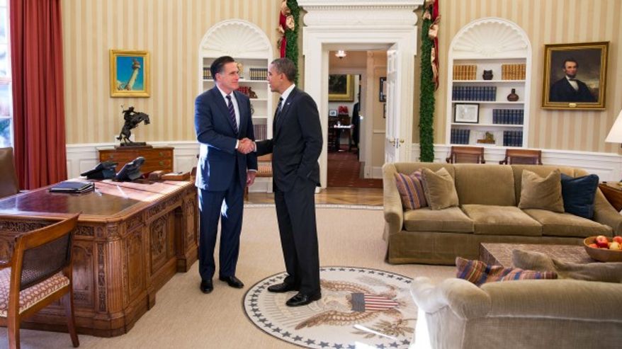 In this photo released by the White House, President Obama and Mitt Romney meet in the Oval Office before their private lunch on Thursday, Nov. 29, 2012.