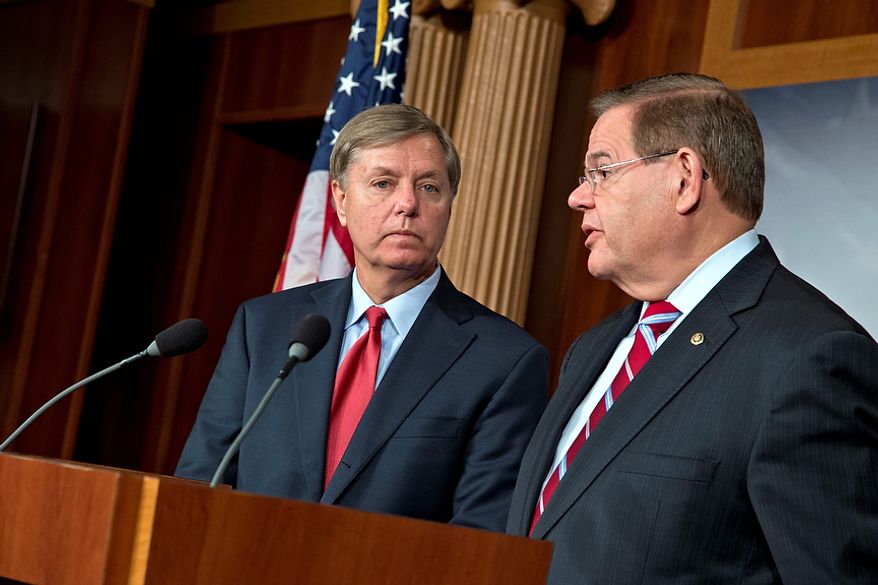 Sen. Lindsey Graham, R-S.C., a member of the Senate Armed Services Committee and Homeland Security Committee, left, joins Sen. Robert Menendez, D-N.J., right, a member of the Senate Foreign Relations Committee, on Capitol in Washington, Thursday, Nov. 29, 2012, to tell reporters they will push for a vote in Congress to kick the Palestinian Liberation Organization out of its Washington offices and withhold U.S. financial aid if the Palestinians seek to use an enhanced U.N. status against Israel. (AP Photo/J. Scott Applewhite)