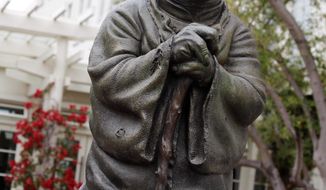 Filmmaker George Lucas said he is moving forward with plans to build a park complete with a statue of Yoda and Indiana Jones in his Marin County hometown of San Anselmo, Calif. (Associated Press)