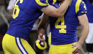 St. Louis Rams kicker Greg Zuerlein, right, is congratulated by Johnny Hekker after making a 54-yard field goal to defeat the San Francisco 49ers 16-13 in overtime of an NFL football game, Sunday, Dec. 2, 2012, in St. Louis. (AP Photo/Tom Gannam)
