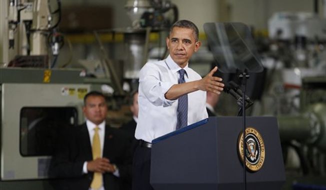 President Obama gestures as he speaks at The Rodon Group manufacturing facility, Friday, Nov. 30, 2012, in Hatfield, Pa. Obama spoke at the toy company about how middle class Americans would see their taxes go up if Congress fails to act to extend the middle class tax cuts. (AP Photo/The Philadelphia Inquirer, Michael S. Wirtz)