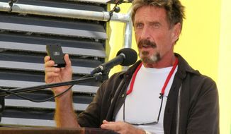 Since being named a “person of interest” by police in Belize in the killing of his neighbor, John McAfee been in hiding. He said Monday that he has left Belize and is still on the run, continuing to hide from police out of fear they want to kill him. (Ambergris Today via Associated Press)
