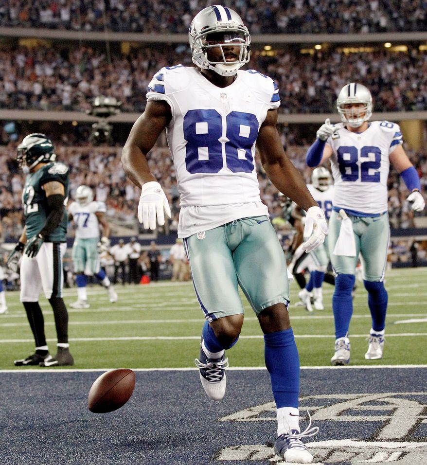 Dallas wide receiver Dez Bryant hauled in six passes for 98 yards and two touchdowns in a 38-33 victory over Philadelphia on Sunday night. (Associated Press)