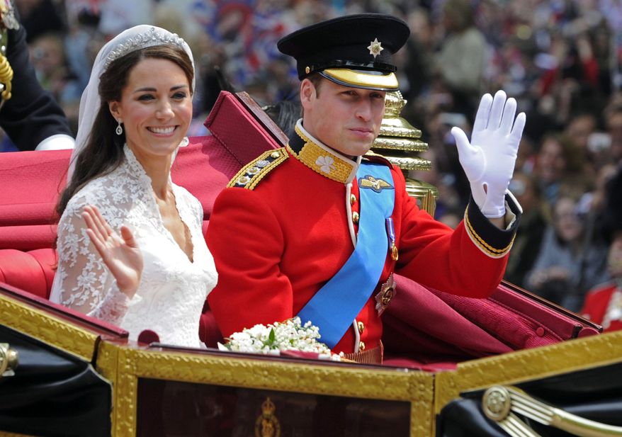 **FILE** Britain's Prince William and his bride, Kate, Duchess of Cambridge, leave Westminster Abbey in London on April 29, 2011, following their wedding. (Associated Press)