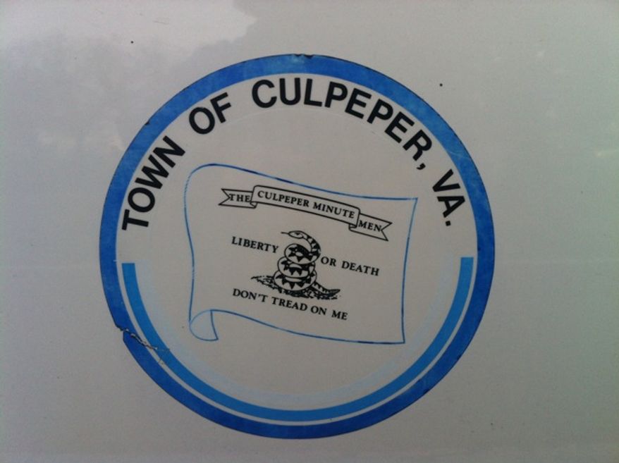 The current logo for Culpeper, Va., is displayed on a town vehicle. (The Washington Times)