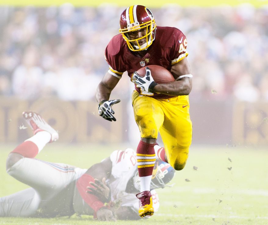 The Redskins lead the NFL in rushing at 167.2 yards per game. Running back Alfred Morris has rushed for a franchise rookie record 1,106 yards. (Craig Bisacre/The Washington Times)