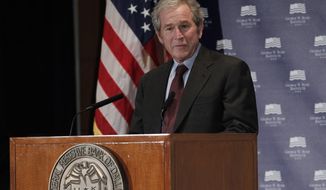Former President George W. Bush gives opening remarks on Dec. 4, 2012, at the Federal Reserve Bank of Dallas for a conference titled &quot;Immigration and 4% Growth: How Immigrants Grow the U.S. Economy.&quot; The George W. Bush Institute was hosting panel discussions highlighting the positive impact of immigration on U.S. economic growth. (Associated Press)