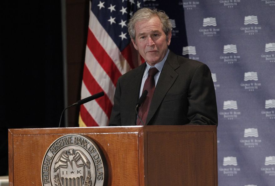 Former President George W. Bush gives opening remarks on Dec. 4, 2012, at the Federal Reserve Bank of Dallas for a conference titled "Immigration and 4% Growth: How Immigrants Grow the U.S. Economy." The George W. Bush Institute was hosting panel discussions highlighting the positive impact of immigration on U.S. economic growth. (Associated Press)