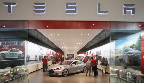 **FILE** The Tesla showroom is seen at the Washington Square Mall in Portland, Ore., on July 20, 2012. (Associated Press)