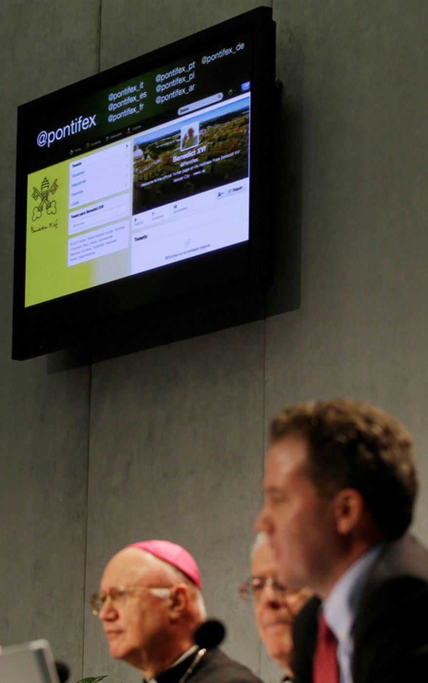 The Pope Benedict XVI Twitter Web page is displayed on a screen during its official presentation at the Vatican Press Hall on Monday, Dec. 3, 2012. (AP Photo/Gregorio Borgia)