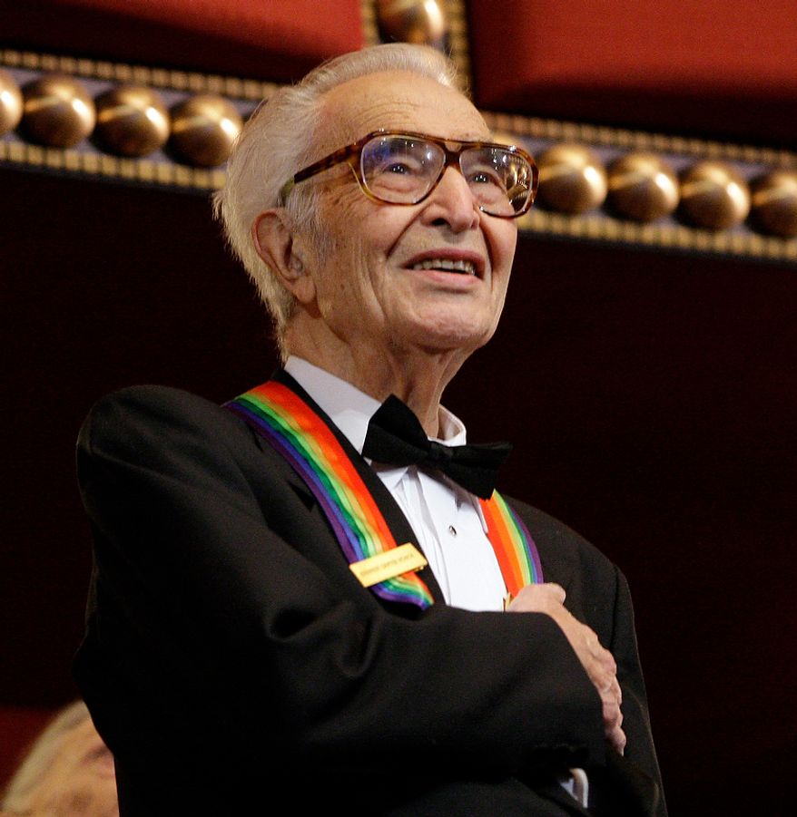 In this Dec. 6, 2009 file photo, Kennedy Center honoree Dave Brubeck stands for the National Anthem at the Kennedy Center Honors gala in Washington. Brubeck, a pioneering jazz composer and pianist died Wednesday, Dec. 5, 2012 of heart failure, after being stricken while on his way to a cardiology appointment with his son. He would have turned 92 on Thursday. (AP Photo/Alex Brandon, File)
