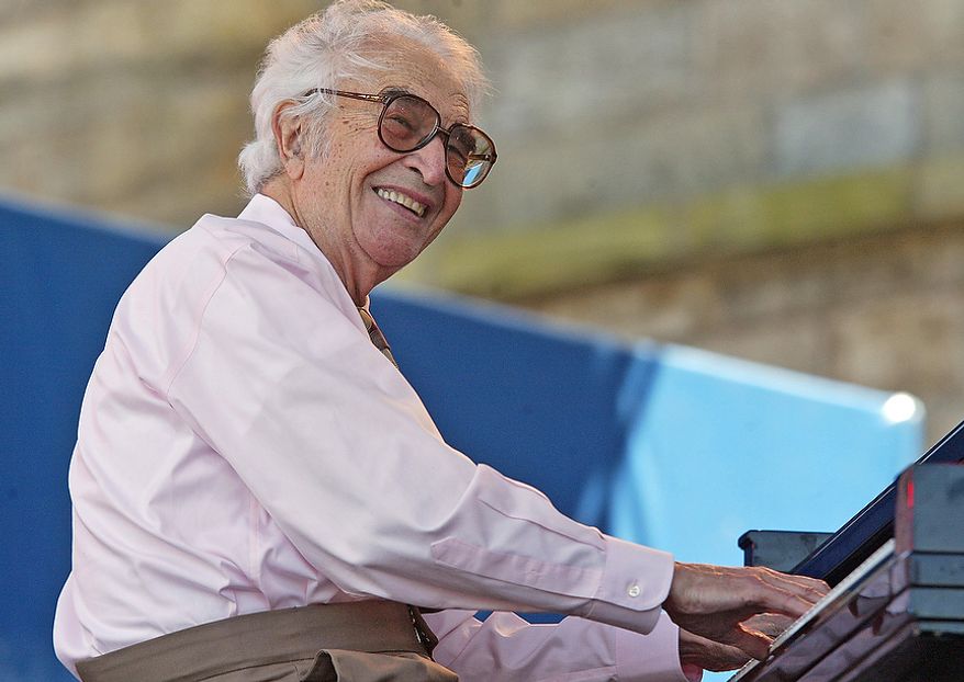 Dave Brubeck and his quartet perform at the JVC Jazz Festival in Newport, R.I., Sunday, Aug. 13, 2006. Fans enjoyed jazz acts on three stages set around the Fort Adams waterfront during the third day of the three day festival. (AP Photo/Stew Milne)