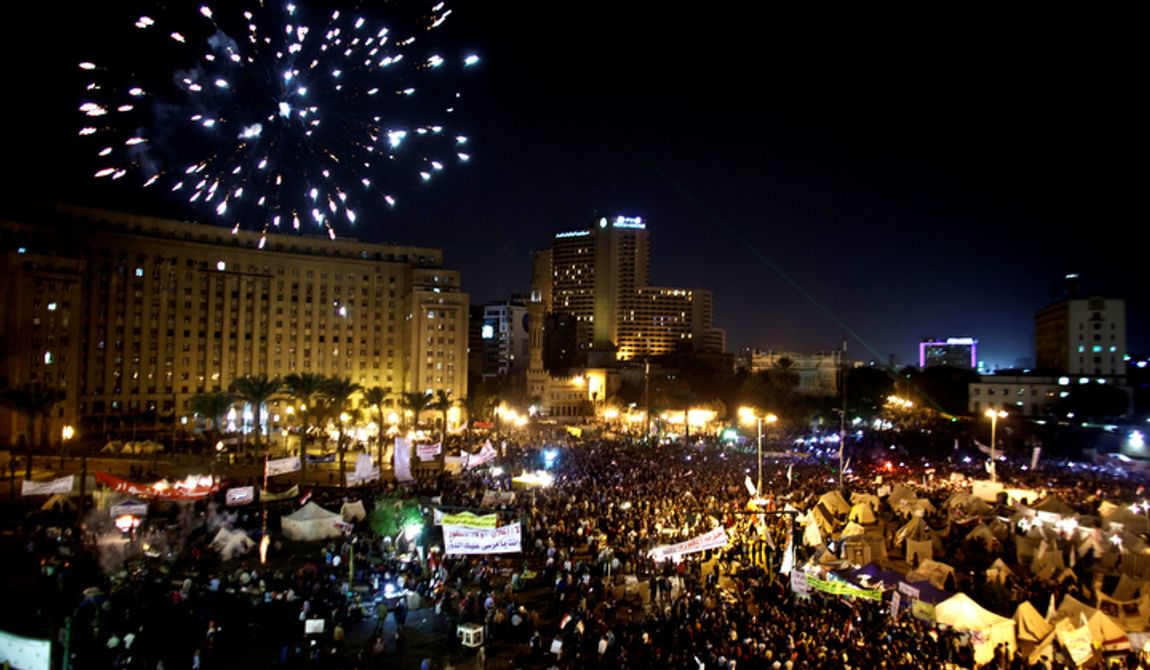 Fireworks burst over Tahrir Square as protesters gather in Cairo on Dec. 4, 2012. Demonstrations by tens of thousands of Egyptians outside the presidential palace turned violent as tensions grew over Islamist President Mohammed Morsi&#x27;s seizure of nearly unrestricted powers. Thousands of protesters also gathered in Cairo&#x27;s downtown Tahrir Square, miles away from the palace, to join several hundred who have been camping out there for nearly two weeks. (Associated Press)