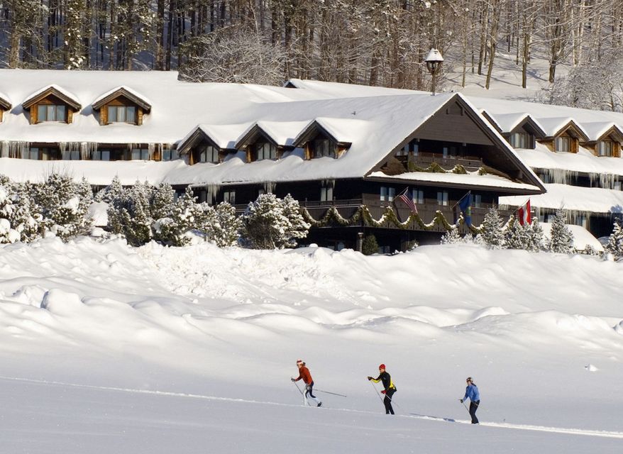 Cross-country skiers pass by the Trapp Family Lodge near Stowe, Vt., in an undated photo. (Associated Press)
