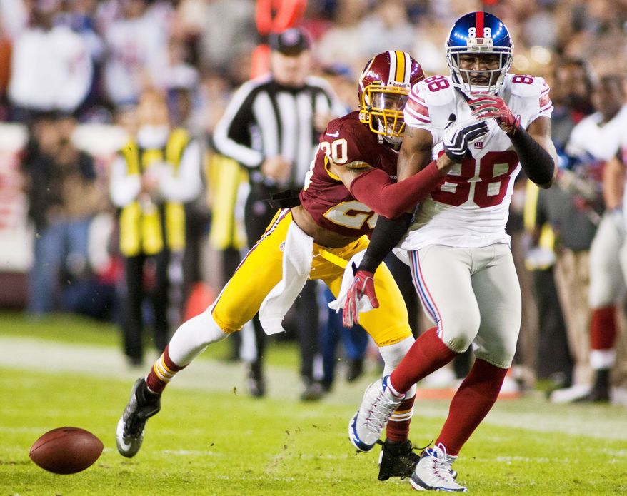 Redskins cornerback Cedric Griffin (left) was suspended four games for using Adderall. (Craig Bisacre/The Washington Times)