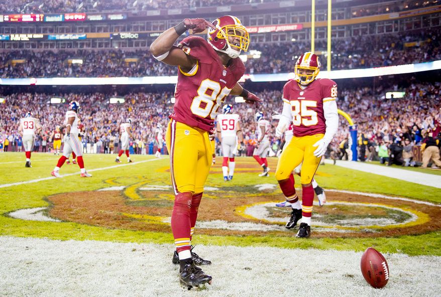 Receiver Pierre Garcon (88) has scored touchdowns in each of the past two games, including this one against the Giants on Monday night. (Andrew Harnik/The Washington Times)