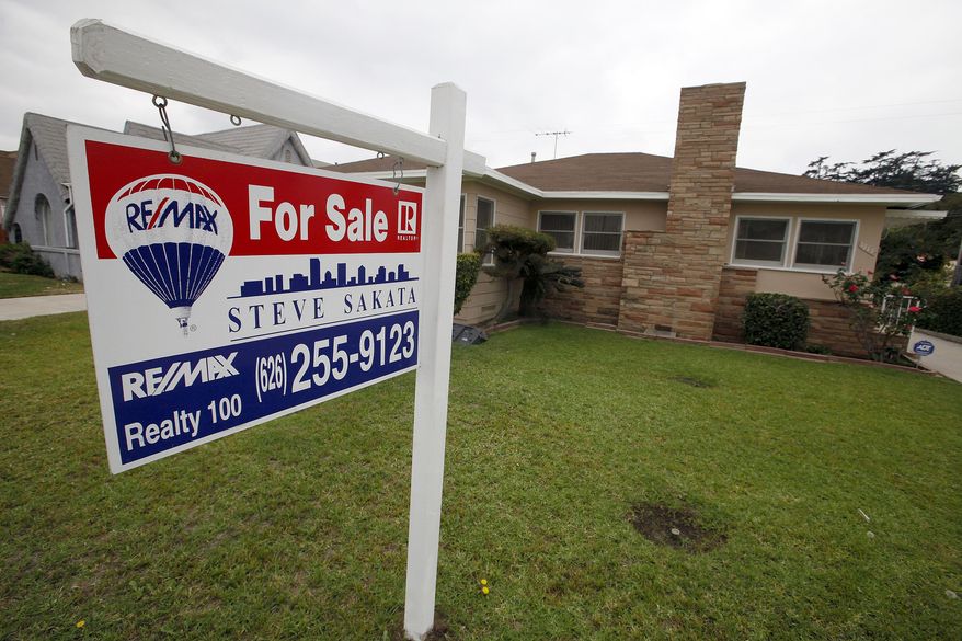 **FILE** A house is shown "for sale" in Alhambra, Calif. on Nov. 8, 2012. (Associated Press)