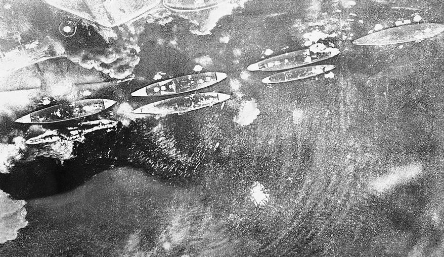This Japanese navy air view of smoking U.S. ships during Pearl Harbor attack appeared in a 1942 publication called "The New Order in Greater East Asia," a copy of which has just become available, Oct. 14, 1945 in New York. (AP Photo)