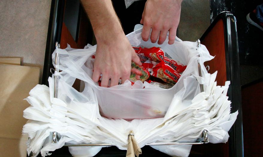 ** FILE ** This Dec. 9, 2012, file photo shows an example of plastic bags used by many retailers. (Associated Press)