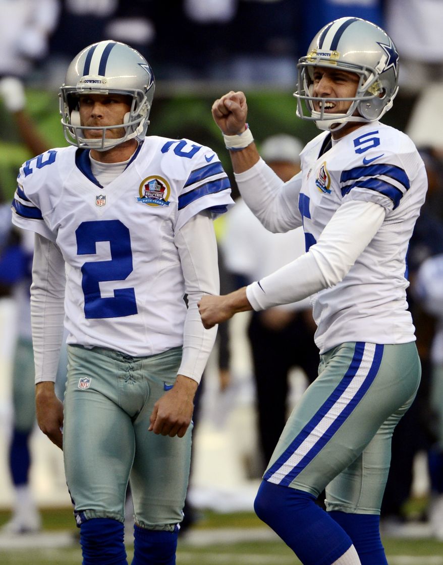 Dallas Cowboys kicker Dan Bailey (5) reacts after making a 40-yard field goal in the final seconds of the fourth quarter of their NFL football game to give them a 20-19 win over the Cincinnati Bengals, Sunday, Dec. 9, 2012, in Cincinnati. Holder Brian Moorman (2) watches. (AP Photo/Michael Keating)