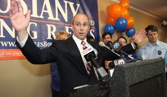 **FILE** Rep. Charles W. Boustany Jr. reacts after receiving news of his election win to Louisiana&#39;s 3rd Congressional District seat while his wife, Bridget, and family Ashley, Jacques, Caree and Erik look on, on Dec. 8, 2012, in Lafayette, La. (Associated Press/The Advertiser)